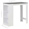 A white bar table with a gray top and built-in shelves, shown with dimensions indicated by text overlays. Náhled obrázku produktu