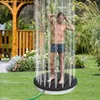 A man is showering outdoors in a garden setting. Náhled obrázku produktu