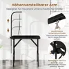 A black grooming table with adjustable arm and safety features is shown against a light-colored background with some decorative elements. Anteprima dell’immagine prodotto