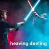 Two people dueling with lightsabers in a smoky environment with red and blue lighting. Produktbild-Vorschau
