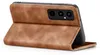 A brown flip case for a smartphone is shown from the side, with the phone's camera array visible. Produktbild-Vorschau