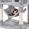 A cat is relaxing in a hammock on a cat tree. Produktbild-Vorschau