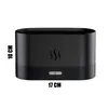 A black aroma diffuser with flame mist effect and control buttons on the front. Voir les images du produit
