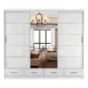 A white sliding door wardrobe with a mirrored center panel, reflecting a bedroom interior with a chandelier and furniture. Produktbild-Vorschau