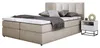 A beige boxspring bed with a mattress and topper, set against a white background, with a small white nightstand to the right. Produktbild-Vorschau