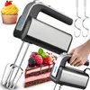 A collage of a hand mixer with a cupcake, a slice of cake, and the mixer's accessories. Produktbild-Vorschau