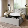 A bed with storage underneath is shown in a bedroom setting. Produktbild-Vorschau