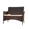 A brown rattan garden bench with a beige cushion, isolated on a white background. Anteprima dell’immagine prodotto