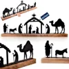 A collection of nativity scene figurines on wooden bases, displayed against a white background. Voir les images du produit
