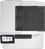 A white HP Color LaserJet Pro MFP M479fdn printer is shown from a front-facing, slightly elevated angle. Podgląd zdjęcia produktu