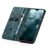 A teal flip case for a Huawei P20 Lite phone, shown open with the phone inside and cards and cash in the wallet section. Produktbild-Vorschau