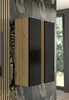 A modern wall cabinet with a wood-effect front and black matte doors, set against a dark, patterned wallpaper. Produktbild-Vorschau