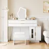 A white vanity table with a mirror, stool, and side cabinet in a bedroom setting. Produktbild-Vorschau