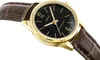 A close-up shot of a gold-colored Casio watch with a black face and a brown leather strap. Produktbild-Vorschau