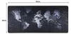 A large mouse and keyboard pad with a world map design. Náhled obrázku produktu