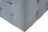 A close-up view of the corner of a tufted ottoman. Náhled obrázku produktu