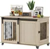 A dog crate furniture piece with decorative items on top. Náhled obrázku produktu