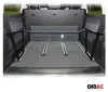 The interior of a van, showing the cargo area with a carpeted floor and metal rails, and black metal brackets installed on the sides. Anteprima dell’immagine prodotto