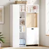 A white bookshelf with several shelves and a cabinet at the bottom, placed in a room with natural light. Produktbild-Vorschau