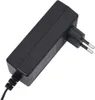 A black power adapter with European plug prongs is shown against a white background. Anteprima dell’immagine prodotto