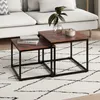 A living room scene with a couch, rug, and nesting coffee tables. Voir les images du produit