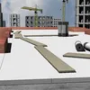 A construction site with building materials and cranes in the background. Náhľad obrázku produktu