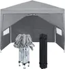 A gray pop-up canopy tent is shown in an open state, with its folded frame and carrying bag displayed in front of it. Náhľad obrázku produktu