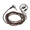 A coiled audio cable with a 3.5mm angled connector on one end and two smaller connectors on the other. Náhled obrázku produktu