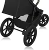 A close-up view of the wheels and lower frame of a black jogging stroller. Náhled obrázku produktu