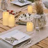 A table setting with candles, food, and a wine glass. Podgląd zdjęcia produktu