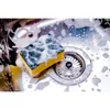 A close-up shot of a sponge in a sink with soap suds. Produktbild-Vorschau