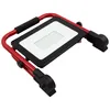 A portable LED work light with a red metal frame and a black housing for the light panel. Produktbild-Vorschau