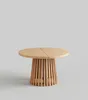 A round wooden table with a slatted base. Produktbild-Vorschau
