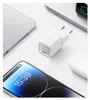 A white Anker 511 Nano III 30W charger is shown on a white surface, surrounded by other electronic devices like a smartphone, tablet, and wireless earbuds. Anteprima dell’immagine prodotto
