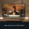 A man is shown on a TV screen, with the title 'CROSS' and the Prime Video logo visible. The text below suggests a voice command to Alexa. Produktbild-Vorschau