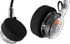 A close-up, studio shot of a pair of transparent Bluetooth headphones with black earcups. Produktbild-Vorschau