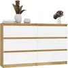 A dresser with white drawers and a wood-grain frame, decorated with vases of dried flowers and books. Anteprima dell’immagine prodotto