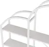 Close-up view of a white shelf unit with multiple shelves. Náhled obrázku produktu