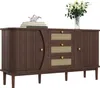 A dark wood sideboard with rattan drawer fronts and gold knobs, decorated with books and a vase of flowers. Podgląd zdjęcia produktu