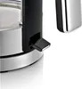 A close-up view of a black lever on a silver and black electric kettle. Anteprima dell’immagine prodotto