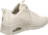 A side view of a beige Skechers sneaker. Voir les images du produit