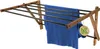 A wall-mounted drying rack with a blue towel hanging on it. Anteprima dell’immagine prodotto