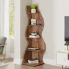 A wooden corner shelf unit with items displayed on it, placed in a room next to a window and a piece of furniture. Produktbild-Vorschau