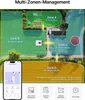 An aerial view of a property divided into multiple zones, with a robotic lawnmower shown in one zone. A smartphone displaying a map management app is also visible. Produktbild-Vorschau