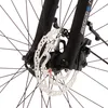 A close-up view of a bicycle's front wheel brake rotor and part of the suspension fork. Produktbild-Vorschau