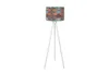 A floor lamp with a patterned lampshade on a white background.