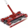 A red cordless sweeper with a white handle, shown from a slightly elevated angle against a white background. Produktbild-Vorschau