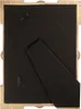 The back of a picture frame with a stand. Voir les images du produit
