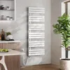 A modern bathroom or kitchen setting with a white towel warmer, cabinetry, and a plant. Produktbild-Vorschau