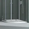 A close-up view of a modern shower stall with glass doors and a white base. Produktbild-Vorschau